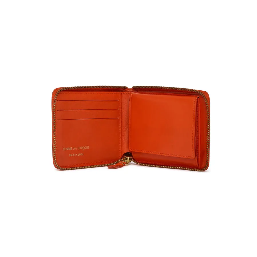 COMME DES GARÇONS ZIP AROUND WALLET ORANGE