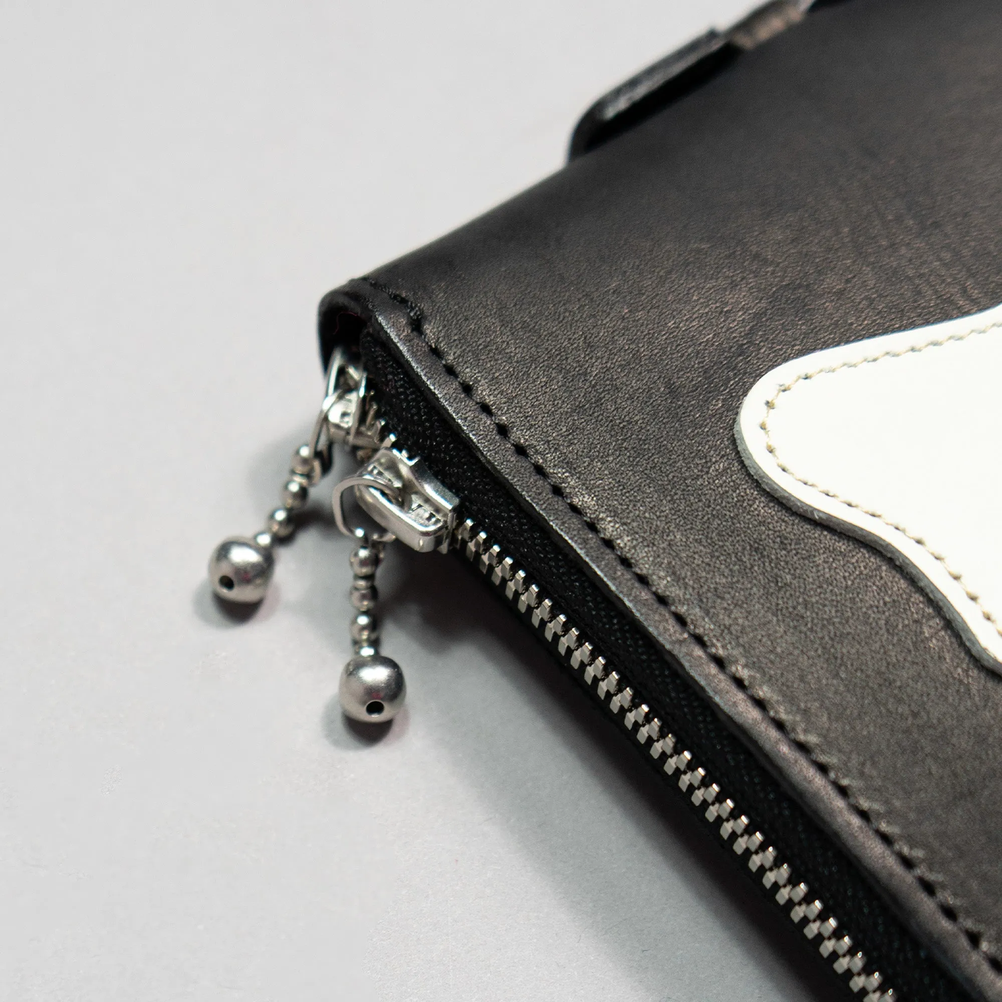 LEATHER BONE HAND PASSCASE